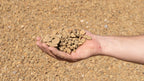 Gold 1/2 inch decorative rock, handful showing size