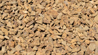 Gold 3/4 inch decorative rock, close-up