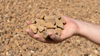 Mocha 3/4 inch decorative rock, handful showing size